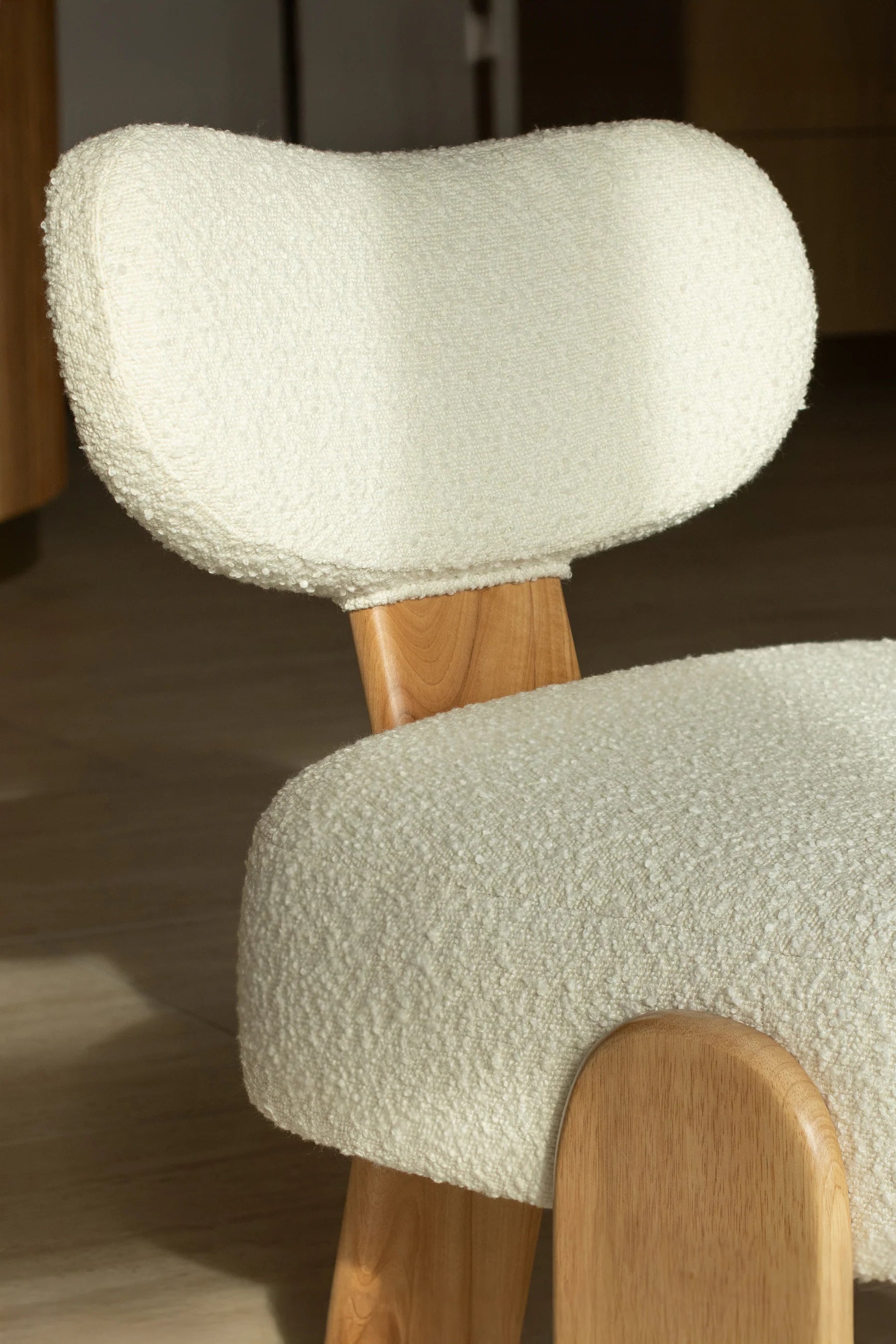 Hella - White bouclé fabric armchair